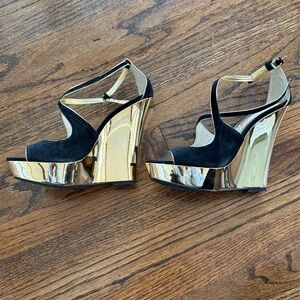 Michael Kors Black and Gold Wedges Size 7 but fit a size 8. See description.